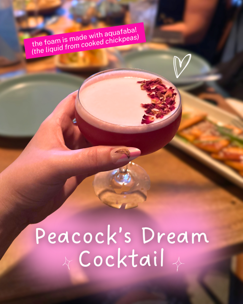Peacock’s Dream cocktail at Burma Love made with aquafaba foam, lemon, beet syrup, and rose petals