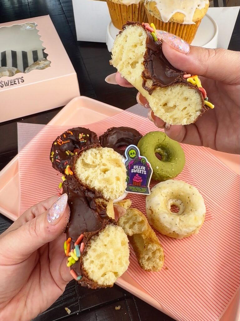 chocolate vegan donut broken open showing soft inside killer sweets modesto