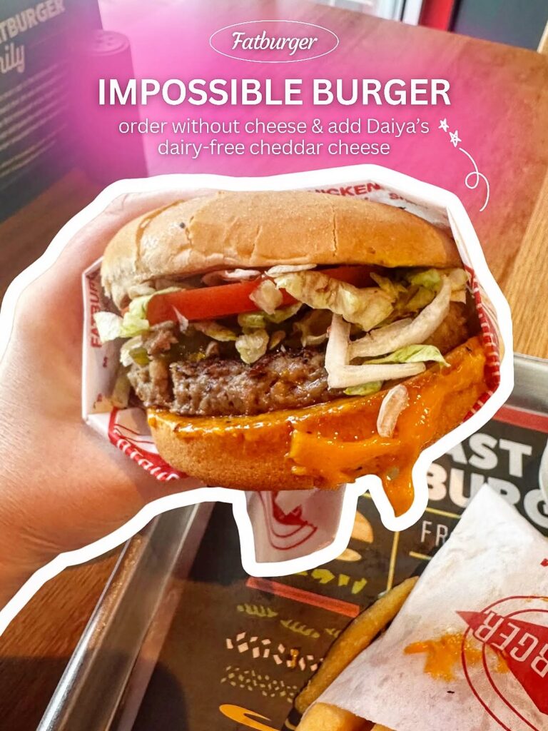 Impossible Burger at Fatburger ordered vegan with Daiya dairy-free cheddar cheese, lettuce, tomato, onions, and pickles.