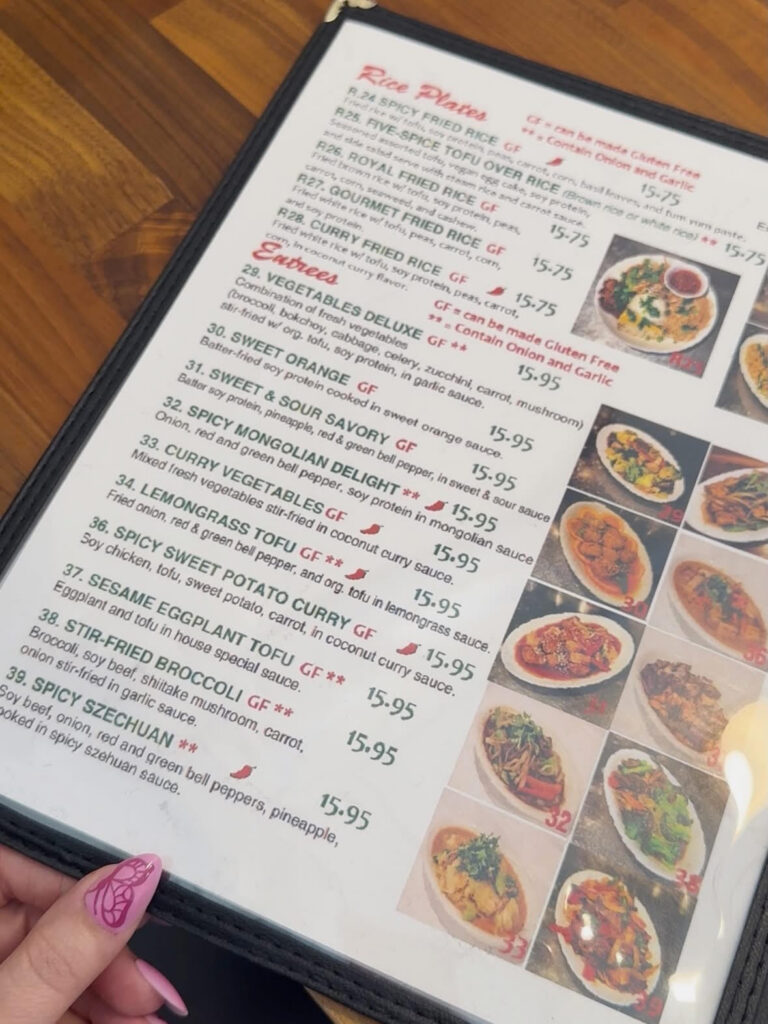 Blossom Vegan menu page displaying additional vegan entrées, appetizers, and specialty dishes with colorful food photography.