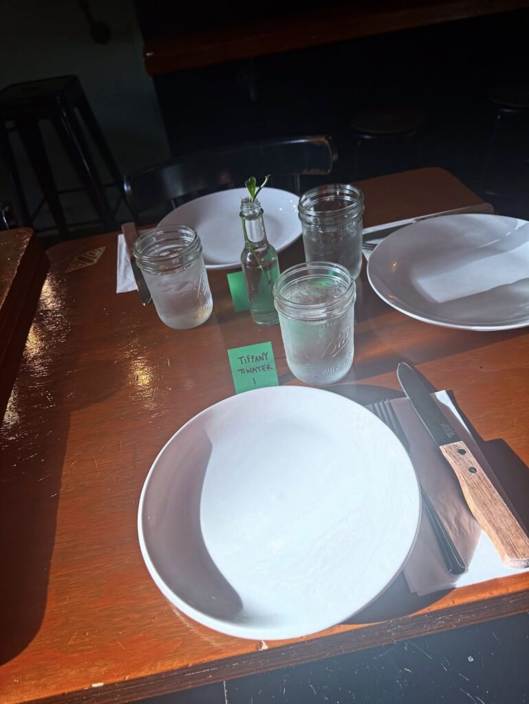 Place setting at Cast Iron Trading Co. before the start of the six-course Vegan Roast dinner.