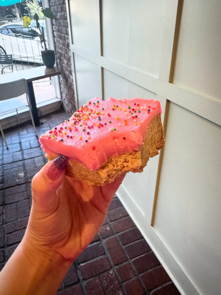 Pink frosted vegan sugar cookie bar from Penny University Coffee in Modesto