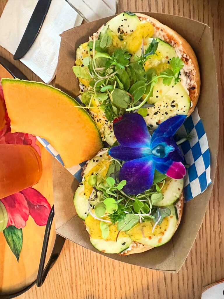 Los Bagels cucumber bagel made vegan at Queen Bean Coffee and Social House