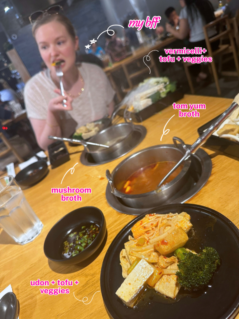 Vegan hot pots with individual soup pots, tofu, vegetables, and dipping sauce at MUMU Hot Pot with labels
