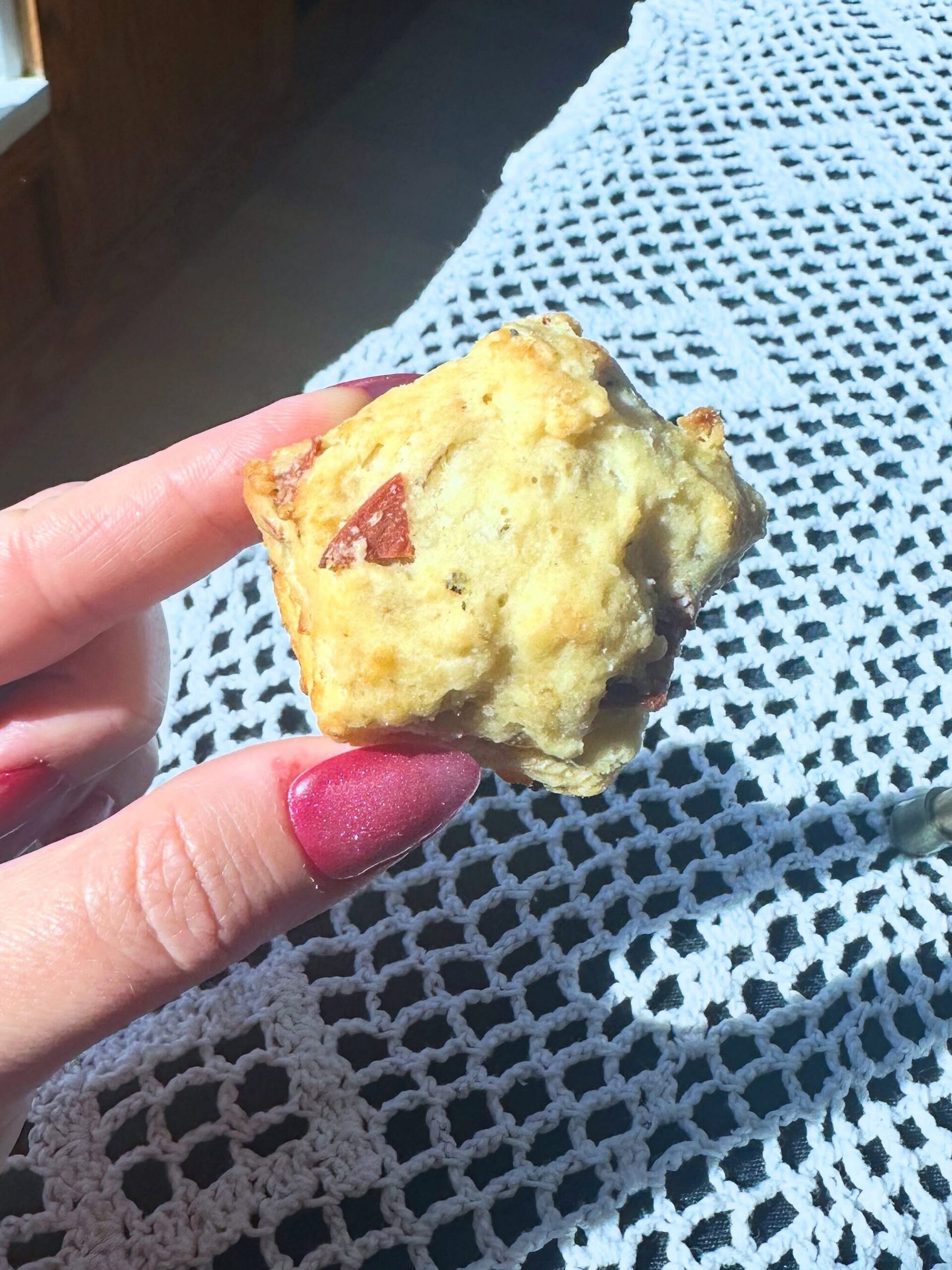 Savory vegan pizza biscuit topped with dairy-free cheese and vegan pepperoni.