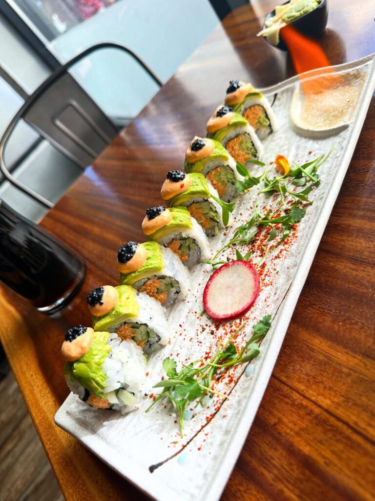 Close-up of the vegan Sunset Roll with plate on fire at Tane Vegan Izakaya in Berkeley