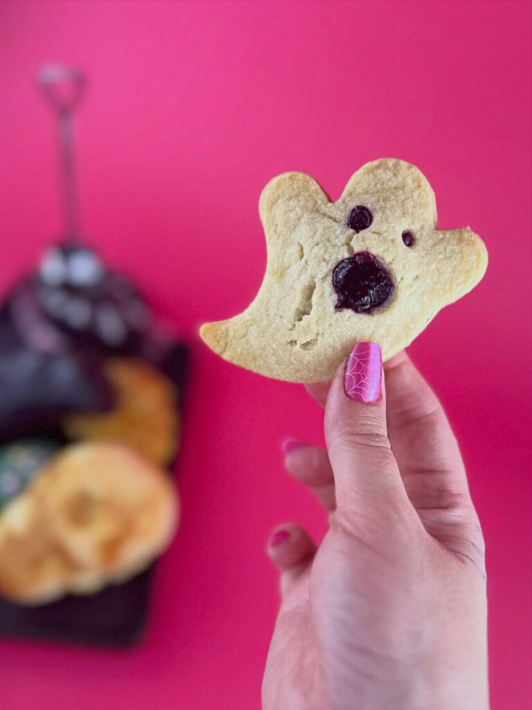 Blueberry ghost hand pie from Vegan Dollhouse shaped like a white ghost with a berry filling.